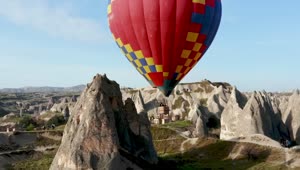 Stock Video Aerial View Of A Hot Air Balloon Flying Live Wallpaper for PC