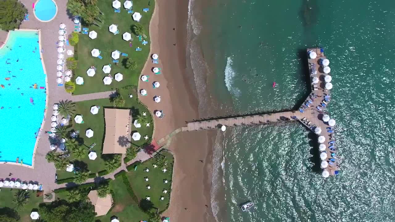 Download Stock Video Aerial View Of A Hotel By The Ocean Live Wallpaper for PC