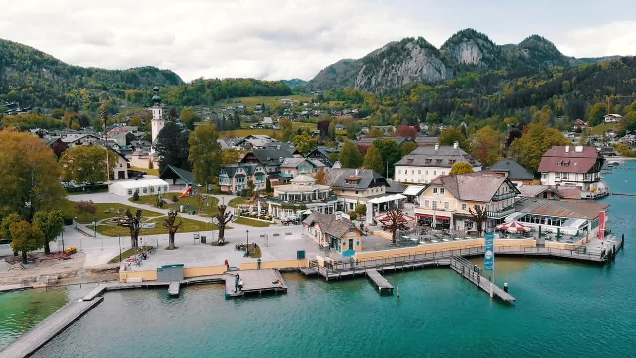 Download Stock Video Aerial View Of A Mountain Village By The Lake Live Wallpaper for PC