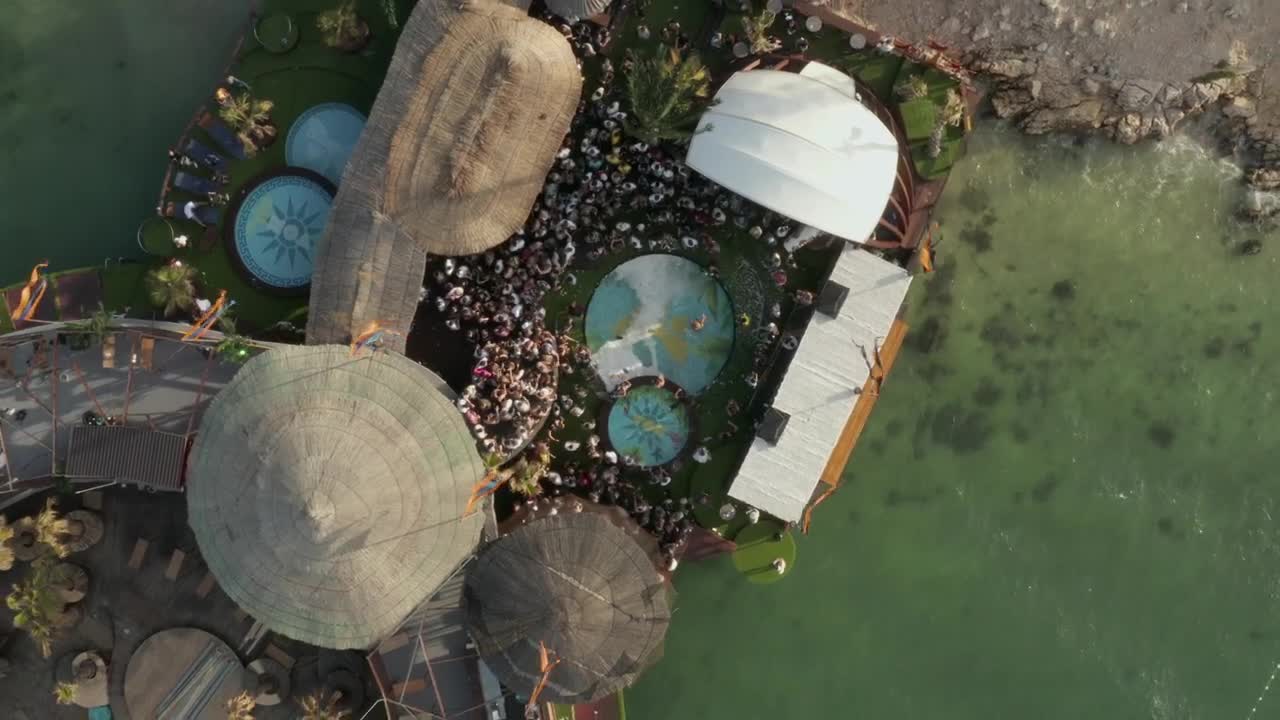 Download Stock Video Aerial View Of A Small Spring Festival In The Beach Live Wallpaper for PC