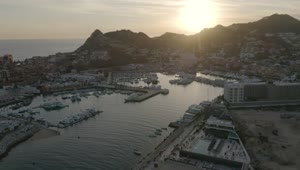 Stock Video Aerial View Of A Tourist Port During Sunset Live Wallpaper for PC