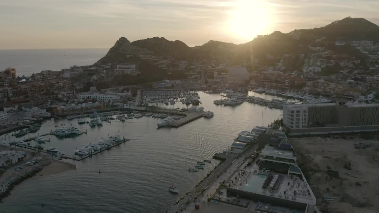 Download Stock Video Aerial View Of A Tourist Port During Sunset Live Wallpaper for PC