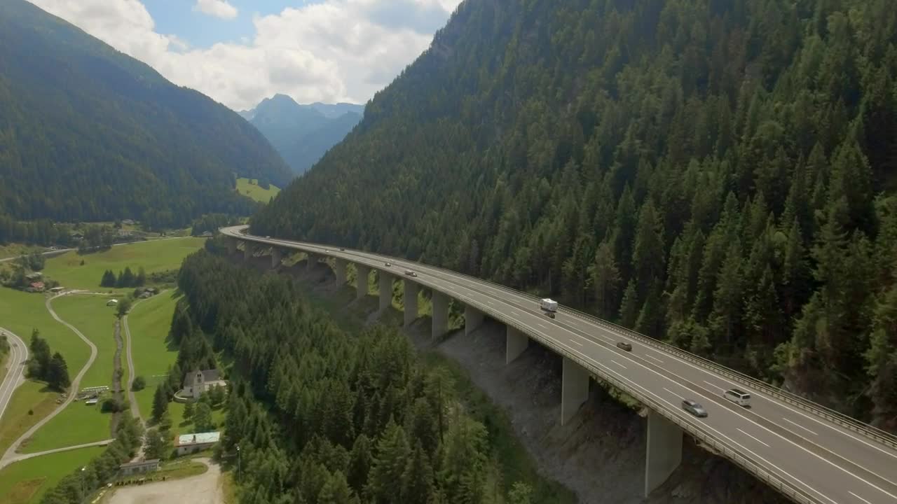 Download Stock Video Aerial View Of Elevated Highway On Austrian Mountain Valley Live Wallpaper for PC