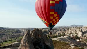 Stock Video Aerial View Of Hot Air Balloon Over Turkish Landscape Live Wallpaper for PC