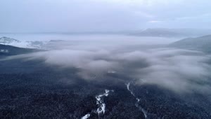 Stock Video Aerial View Of Mountains Covered With Mist Live Wallpaper for PC