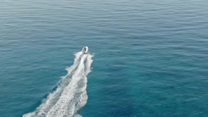 Stock Video Aerial View Of Speed Boat In Sparkling Sea Live Wallpaper for PC