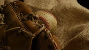 Stock Video Baseball Glove And A Used Ball Over A Fabric Live Wallpaper For PC