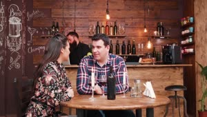 Stock Video Barista Surprises Woman With Gift During Wine Date In Hip Live Wallpaper For PC