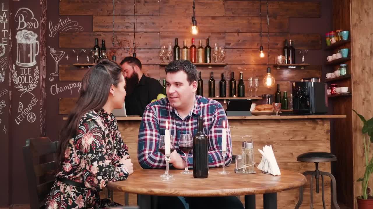 Download Stock Video Barista Surprises Woman With Gift During Wine Date In Hip Live Wallpaper For PC