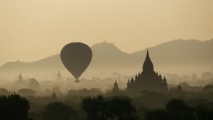Stock Video Balloon Flying During Sunrise Over Ancient Temples Live Wallpaper For PC