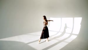 Stock Video Ballerina Spins In Black Tutu In Sunlit White Room Live Wallpaper For PC