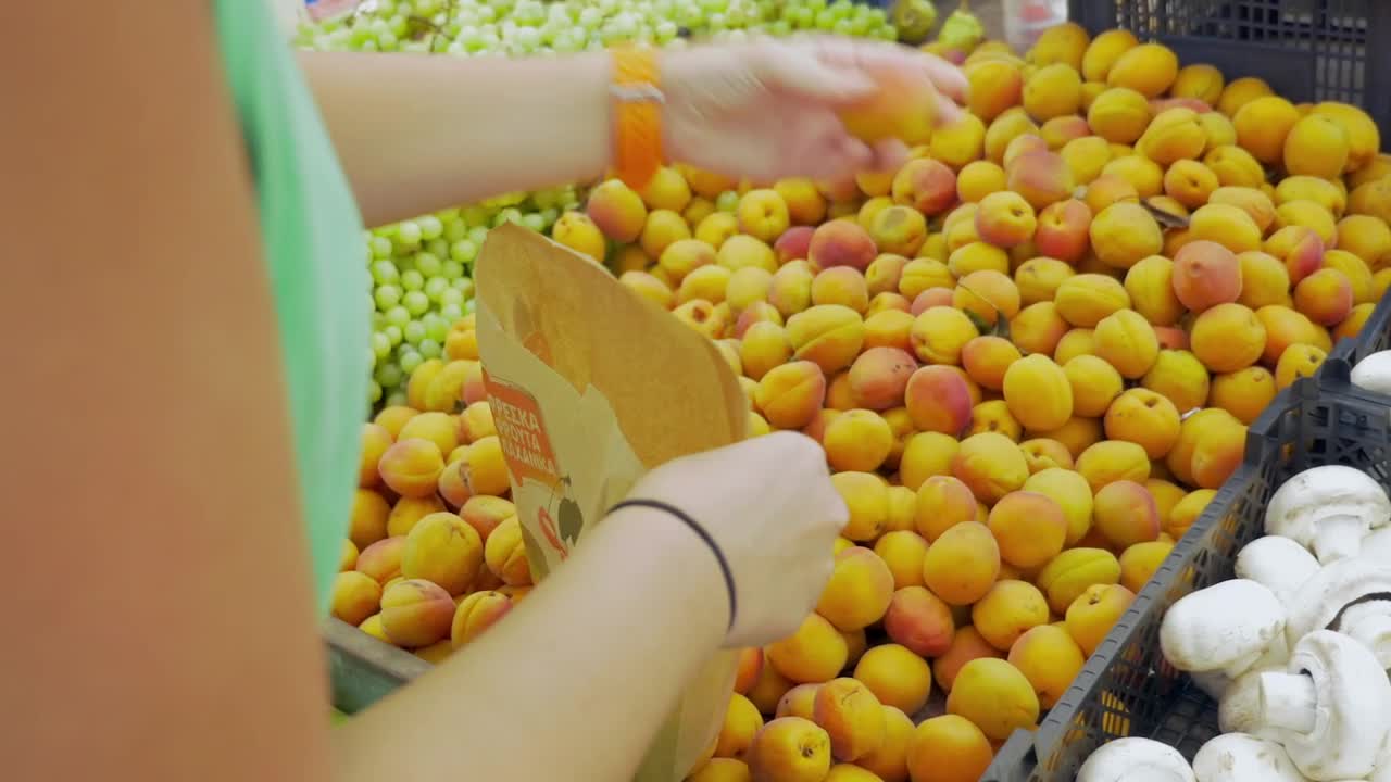 Download Stock Video Bagging Apricots In Store Live Wallpaper For PC
