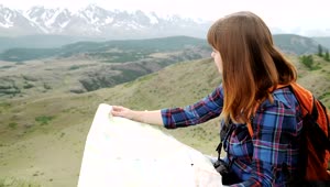 Stock Video Backpacker Checks Her Map From Viewpoint Live Wallpaper For PC