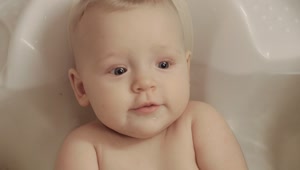 Stock Video Baby Girl Chewing A Bath Toy Live Wallpaper For PC