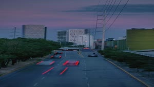Stock Video Avenue With Trees Buildings And Fast Cars At Dusk Live Wallpaper For PC