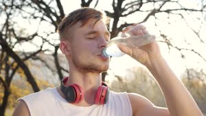 Stock Video Athlete Man Drinking Water In His Training Live Wallpaper For PC
