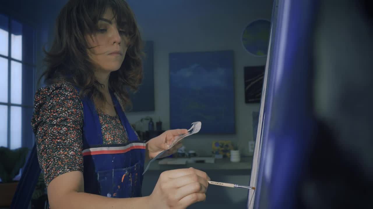 Download Stock Video Artist Working On A Painting In Detail Live Wallpaper For PC