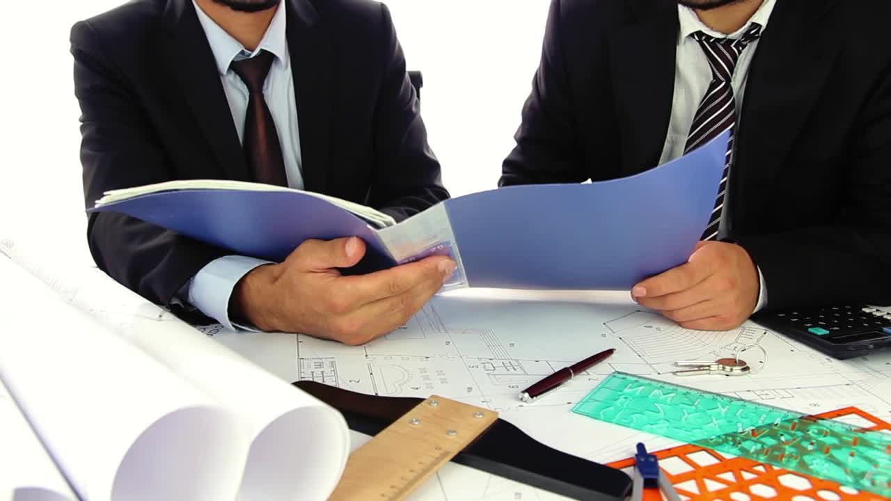 Download Stock Video Architects In Suit Reviewing Papers In A Folder Live Wallpaper For PC