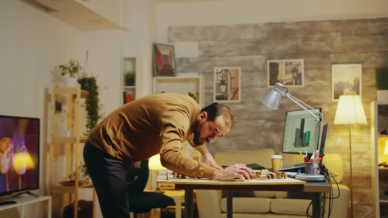 Download Stock Video Architect Working On A Model At An Office Live Wallpaper For PC