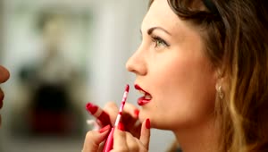 Stock Video Applying Red Lipstick On A Woman Live Wallpaper For PC
