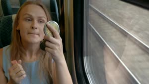 Stock Video Applying Makeup On A Train Live Wallpaper For PC