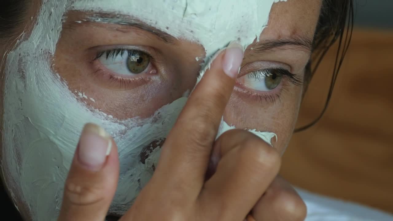 Download Stock Video Applying A Beauty Mask Close Up Live Wallpaper For PC