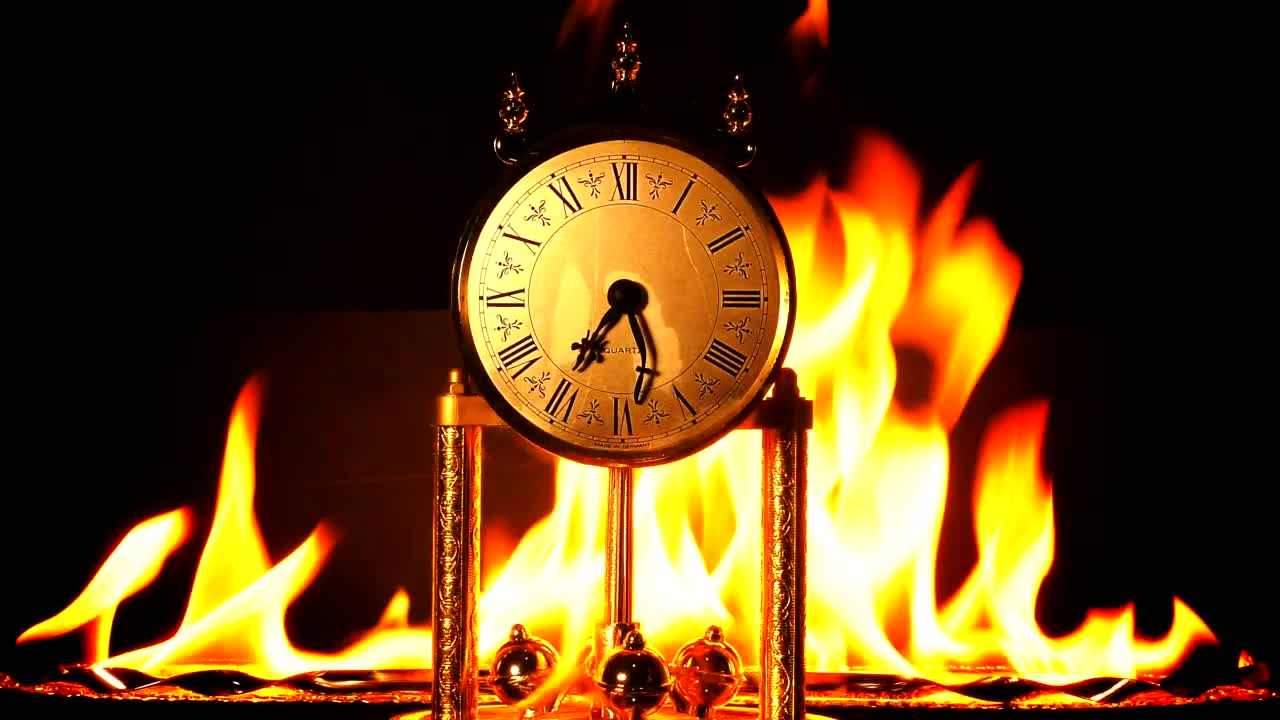 Download Stock Video Antique Clock Burning On Black Background Live Wallpaper For PC