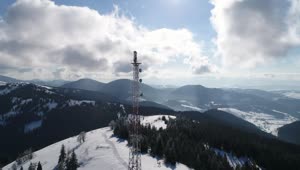 Stock Video Antenna Tower In A Snowy Mountain Range Live Wallpaper For PC