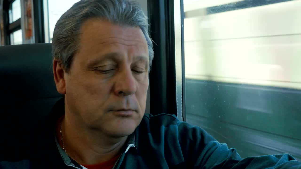 Download Stock Video Answering His Phone On A Train Live Wallpaper For PC