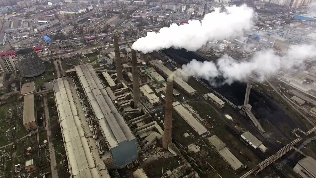 Download Stock Video An Industrial Complex With Tower Smoke Live Wallpaper For PC