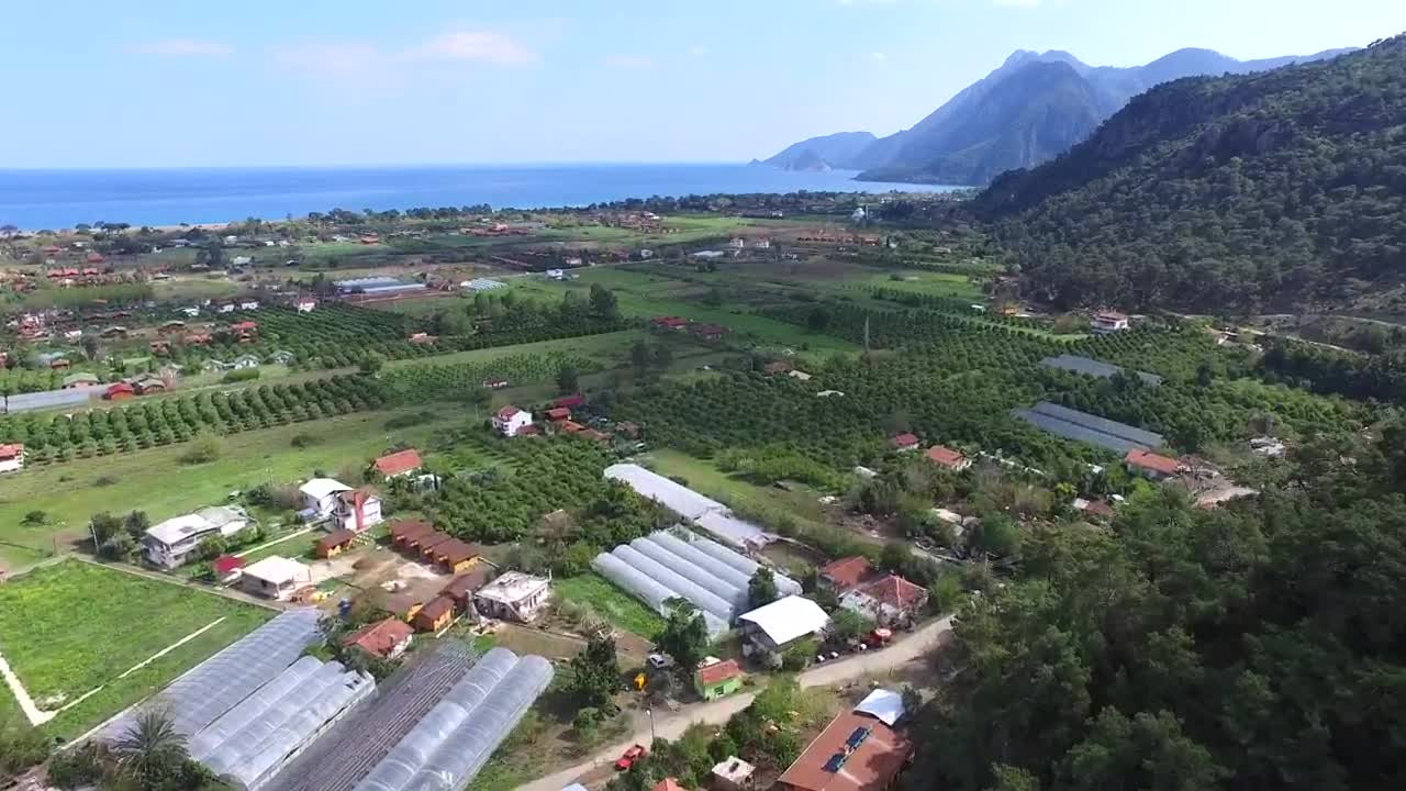 Download Stock Video An Agricultural Plain Near Sea And Forest Live Wallpaper For PC