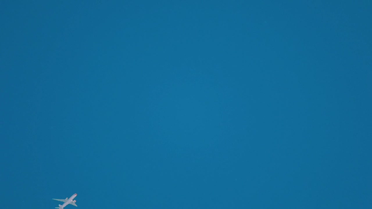 Download Stock Video Airplane Crossing The Clear Blue Sky Live Wallpaper For PC