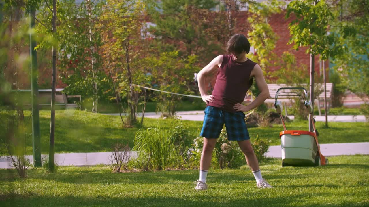 Download Stock Video A Young Man Warming Up In The Park Live Wallpaper For PC