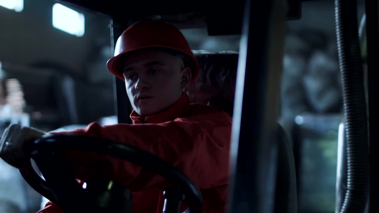 Download Stock Video A Worker Driving Through The Warehouse Live Wallpaper For PC