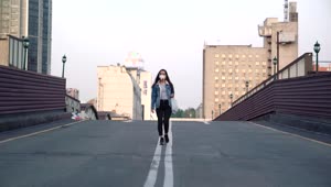 Stock Video A Woman Walking In The Middle Of An Empty Street Live Wallpaper For PC