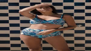 Stock Video A Woman In A Bikini In Front Of A Tiled Live Wallpaper For PC