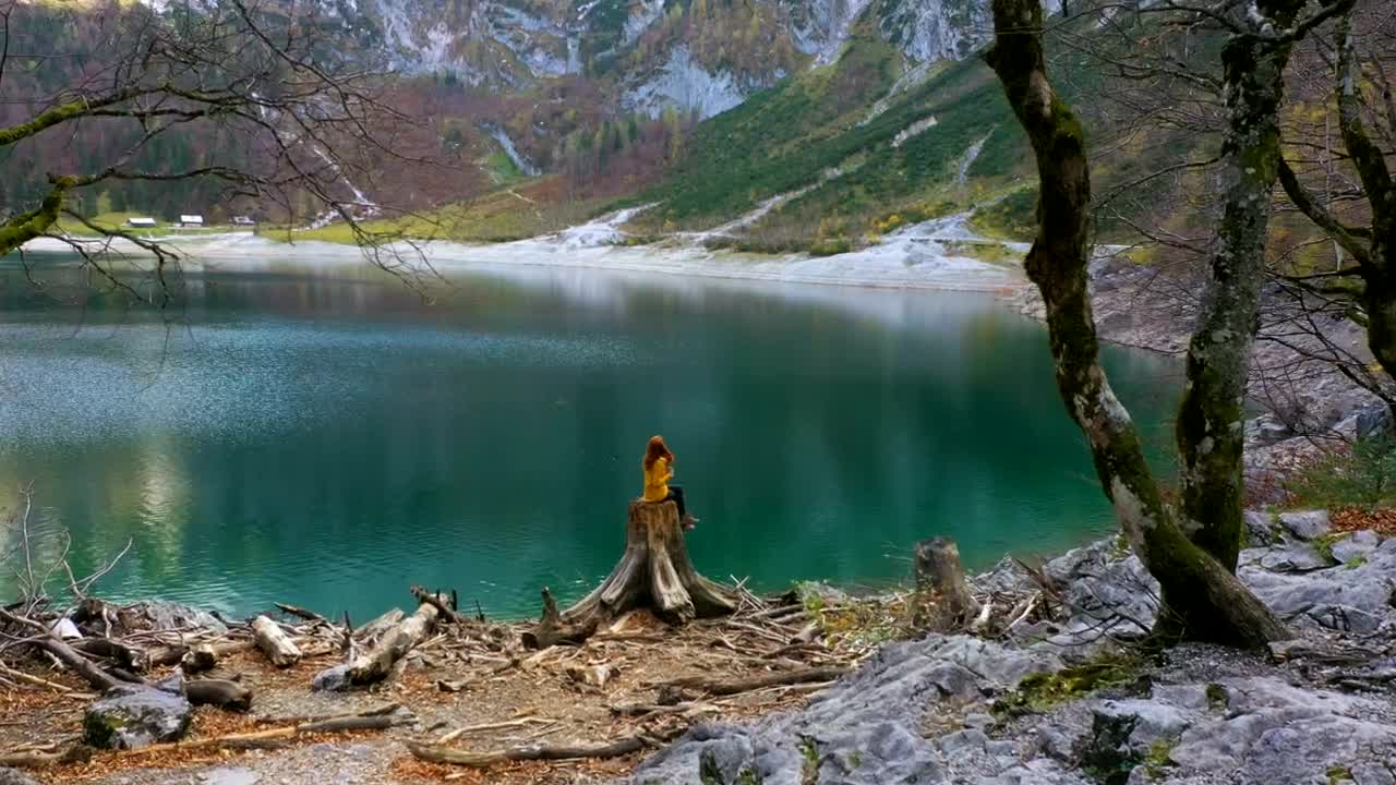 Download Stock Video A Woman And A Crystal Water Lake In The Mountains Live Wallpaper For PC