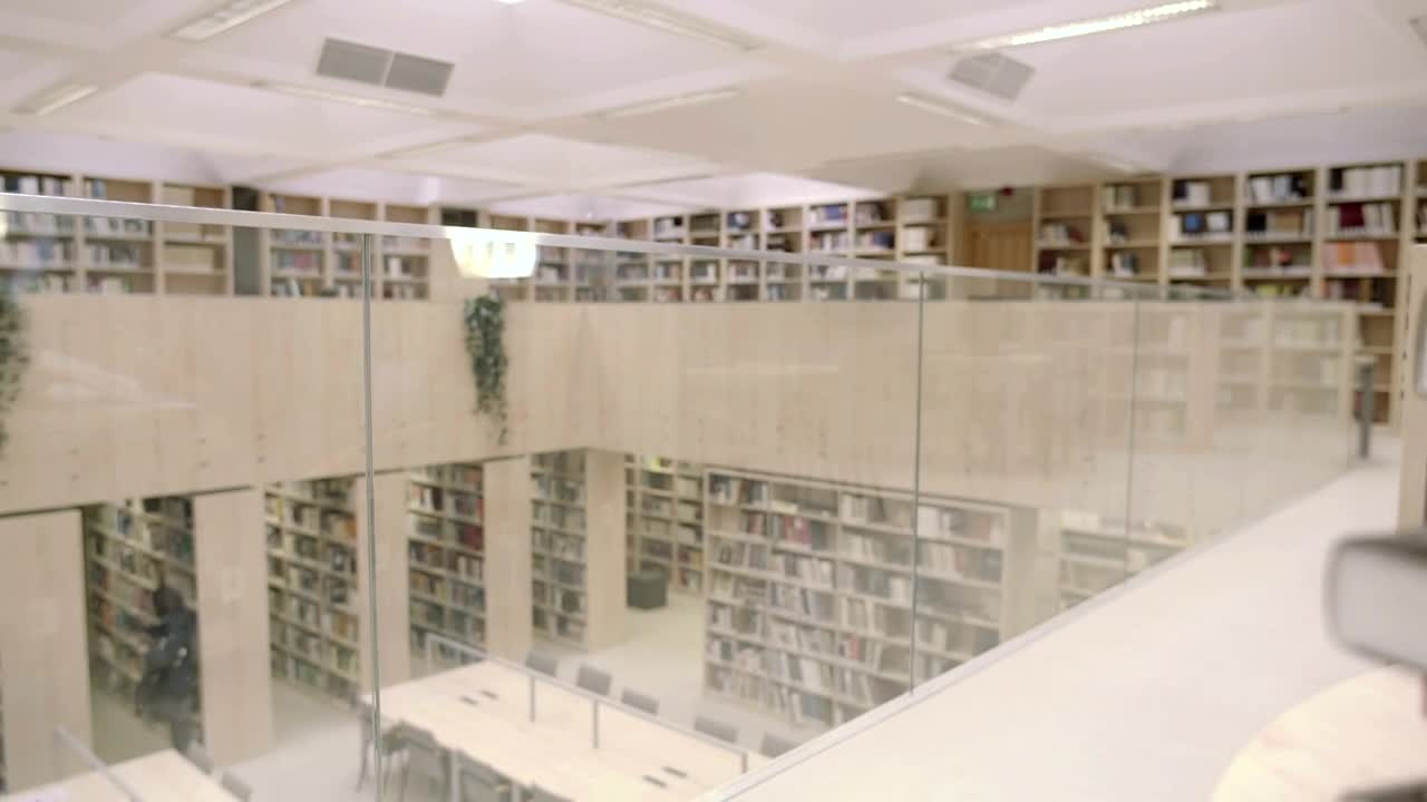 Download Stock Video A Tired Student In The Library Live Wallpaper For PC