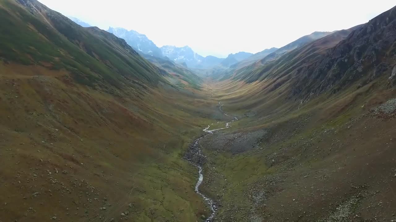 Download Stock Video A Small River At The Bottom Of The Valley Live Wallpaper For PC