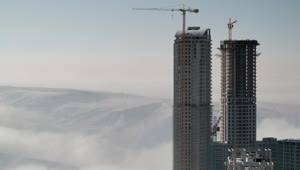 Stock Video A Skyscraper Under Costruction Above The Clouds Live Wallpaper For PC