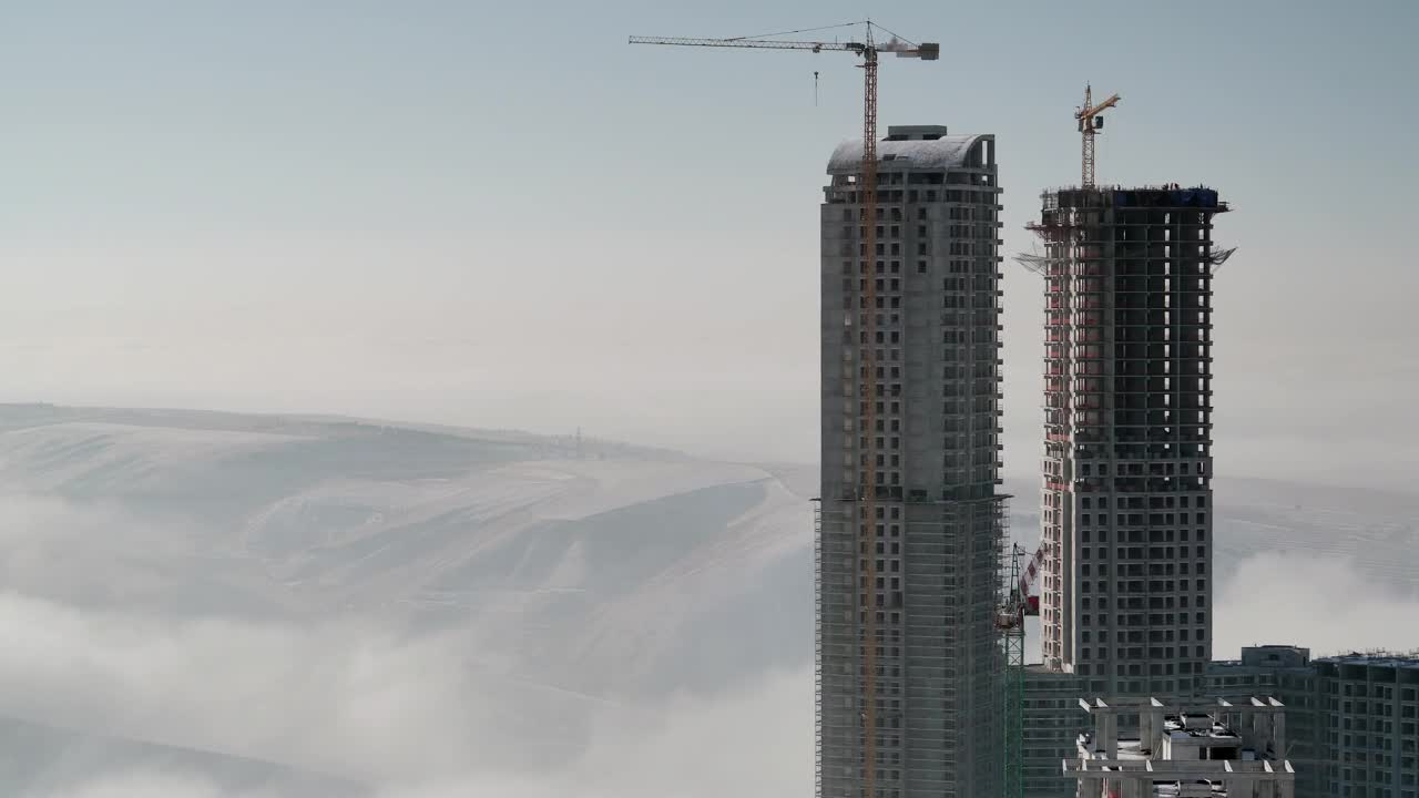 Download Stock Video A Skyscraper Under Costruction Above The Clouds Live Wallpaper For PC