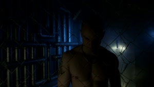 Stock Video A Shirtless Man With Metal Chain Behind The Fence Live Wallpaper For PC