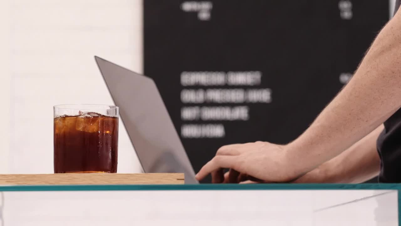 Download Stock Video A Person Working While Drinking Coffee Live Wallpaper For PC