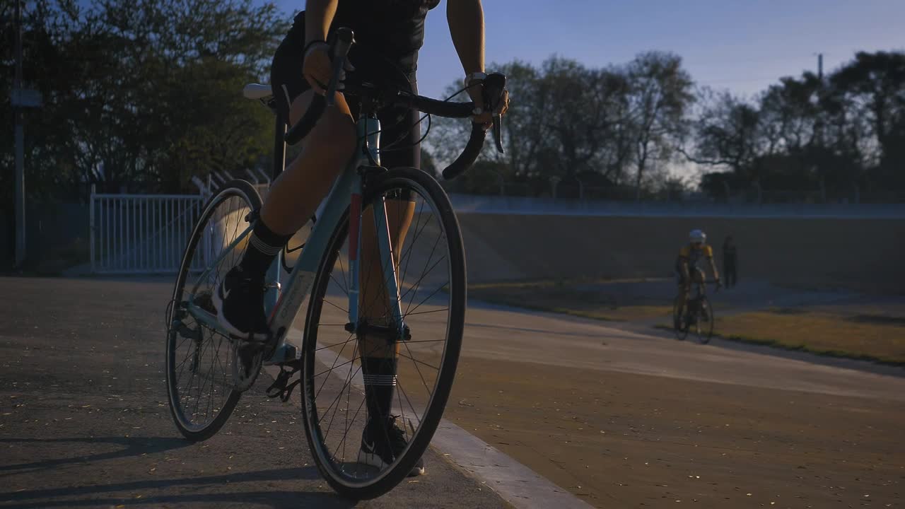 Download Stock Video A Person Riding A Bicycle To The Side Of A Live Wallpaper For PC