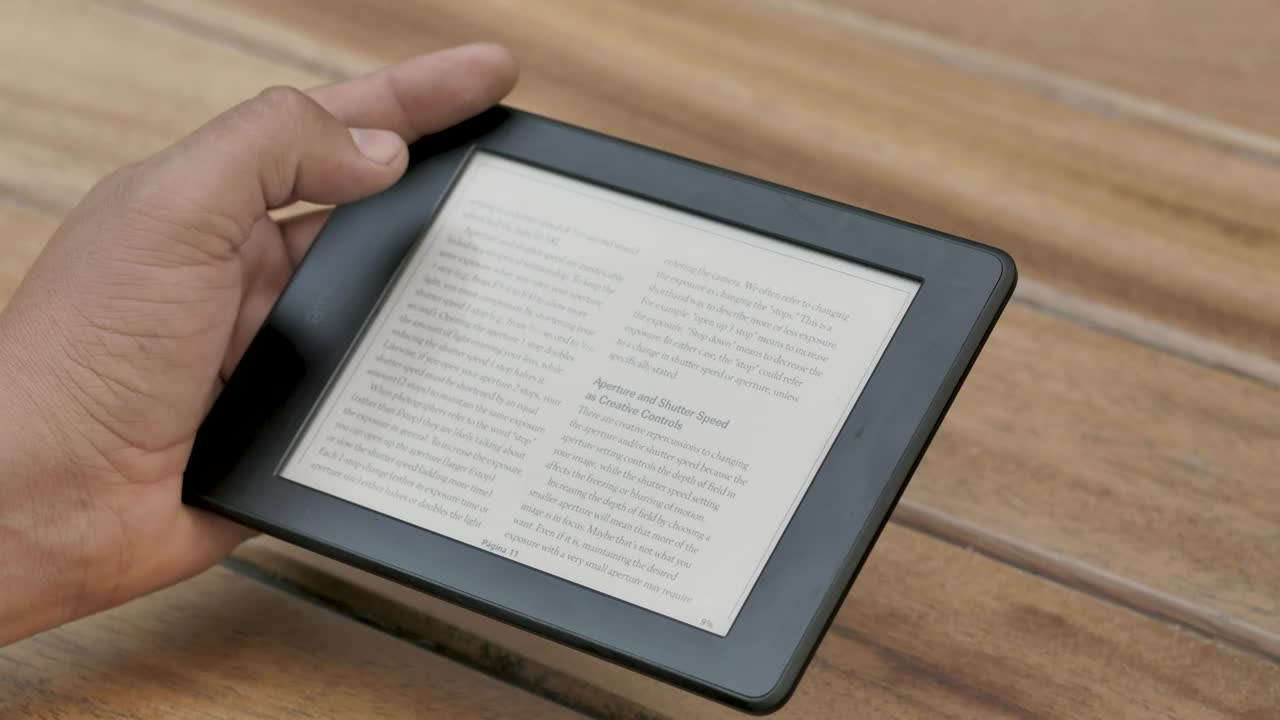 Download Stock Video A Person Reading An Ebook While Drinks Coffee Live Wallpaper For PC