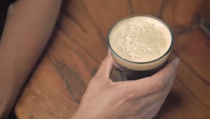 Stock Video A Person Drinks A Glass Of Beer Live Wallpaper For PC