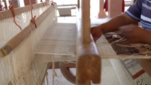 Stock Video A Mexican Person Weaving A Cloth On A Large Loom Live Wallpaper For PC