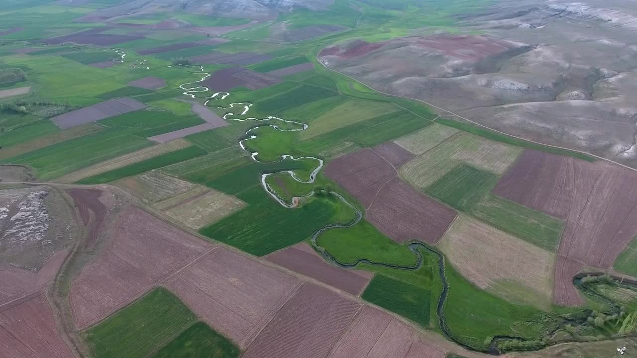 Download Stock Video A Meandering River Between The Agricultural Fields Live Wallpaper For PC