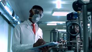Stock Video A Man With A Face Mask Checking Laboratory Live Wallpaper For PC