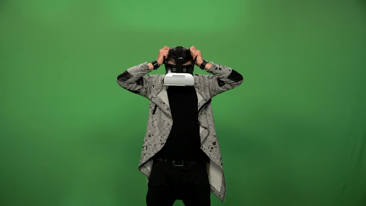 Download Stock Video A Man Using A Virtual Reality Headset Live Wallpaper For PC